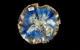Studio Pottery Handcrafted Bowl, with a wavy leaf shaped rim with a deep blue and iridescent