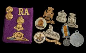 Bag of Miscellaneous Military Badges, and boxed ARP Badge. 10 pieces.