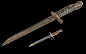 Antique Short Bayonet, signs of wear to the handle and blade, as found. Overall size 13'', with an