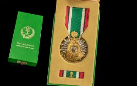 Saudia Arabia Medal for the Liberation of Kuwait, with bar, finely fitted in a green gilt tooled box