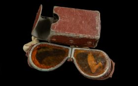 R.F.C. First World War 1914-18 Aviator Goggles, with amber coloured lenses, in the original box.