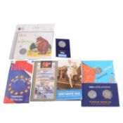 Seven Brilliant Uncirculated 50p coin packs