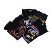 A collection of '90s/'00s tour/concert t-shirts, and other t-shirts