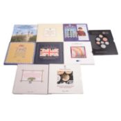 Nine Royal Mint Brilliant Uncirculated Coin Sets.