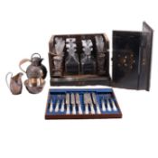Ebonsied four-bottled decanter box, other decanters, glassware and silver plate