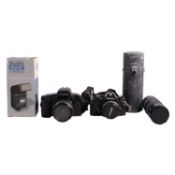 Collection of cameras, lenses and other equipment.