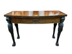 In the Manner of Thomas Hope. A Regency and later brass inlaid rosewood banded mahogany bowfront