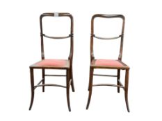A pair of 19th century German correction chairs, height 85cm