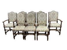 A set of eight 18th century style upholstered oak dining chairs, two with arms