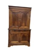 A 19th century French Biedermeier walnut side cabinet, width 125cm, depth 58cm, height 214cm