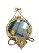 A Victorian giltwood and composition girandole wall mirror, width 33cm, height 70cm