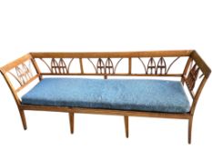 An early 19th century Swedish fruitwood bench, width 201cm, depth 56cm, height 82cm