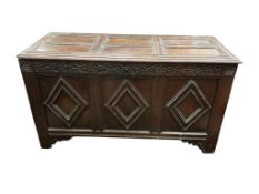 A 17th century and later panelled oak coffer, width 131cm, depth 56cm, height 73cm