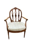 An Edwardian Hepplewhite style painted satinwood elbow chair, width 71cm, depth 50cm, height 96cm
