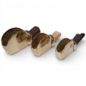 A set of three low angle brass thumb planes with flat soles and rosewood wedges, widest iron 16mm