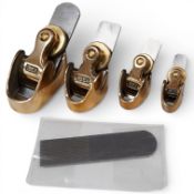 A graduated group of four Ibex bronze violin maker’s planes, approx width of irons; 23mm flat (