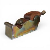 An unmarked dovetailed adjustable bullnose plane with gunmetal sides and steel sole, rosewood wedge,
