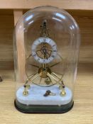 A modern lacquered brass skeleton mantel timepiece by Sinclair Harding & Co, with silvered chapter