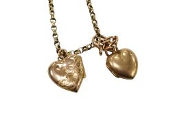 An early 20th century yellow metal belcher link chain, stamped 9c, hung with two heart shaped locket