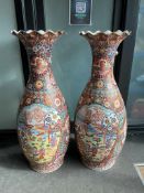 A pair of massive Japanese Imari style baluster vases, height 123cm.