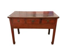 A Chinese red lacquer side table, width 121cm, depth 56cm, height 90cm