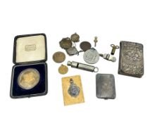 A collection of sundry items to include a silver matchbook case, a case silver medal, other