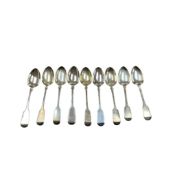 A harlequin set of nine 19th century silver fiddle pattern table spoons, various dates and makers,