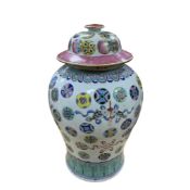A Chinese enamelled porcelain ‘Eight Buddhist Emblems’ baluster vase and cover, late 19th century,