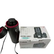 A Canon EOS 600D camera contained within its original card box with instruction manual, together