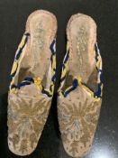 A pair of early 19th century ladies beige velvet, metallic gold and silver couched embroidered