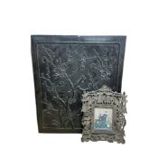A Chinese carved wood prunus panel and a gouache figural painting, in carved wood frame, panel