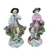 Two Derby porcelain figures, a gentleman holding grapes and the other playing an instrument, 19cm