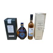 A collection of four bottles of spirits, comprising Bas Armagnac Château de Laubade, Aberlour A'