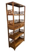 A Chinese rosewood open bookcase, width 86cm, depth 35cm, height 186cm