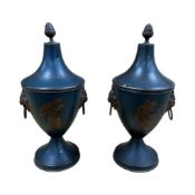 A pair of late 18th century toleware chestnut urns and covers, height 28cm.