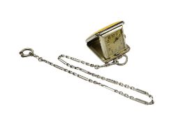 An early 20th century Eterna 925 white metal and yellow enamel travelling watch, with Arabic dial,