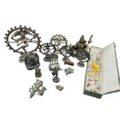 A group of Tibetan style bronze figures of deities and a large Chinese glass bead necklace, largest.