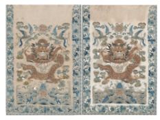 A pair of late 19th century framed Chinese embroidered wedding skirt panels, embroidered on cream