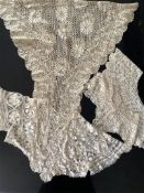 A collection of four 19th century silk Maltese bobbin lace items; including an unusual bolero, a