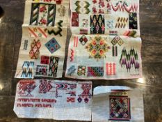 A 19th century multi-patterned spot motif wool worked sampler on thick linen with pink silk edging
