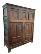 A late 17th century panelled oak cupboard, width 133cm, depth 52cm, height 160cm