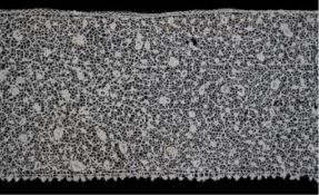 A late 17th century wide flounce of Point de France needle lace, together with a narrower flounce,