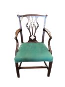 A George III mahogany elbow chair, width 58cm, depth 54cm, height 93cm
