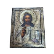 A Russian hand painted icon with silver-gilt oklad, early 20th century, 18 x 14cm