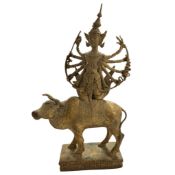 A large Thai gilt bronze and composition group of Shiva riding the bull Nandi, 43cm tall.