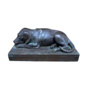 A Keswick Art bronze of a recumbent dog, length 20cm.