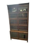 A Globe Wernicke style five section oak bookcase, width 89cm, depth 29cm, height 175cm