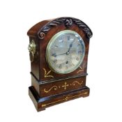 A Regency cut brass inlaid mahogany bracket timepiece with circular silvered dial, height 24cm.
