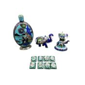 A white metal and enamel oriental flask, 13cm high, together with two Indian enamel elephants and