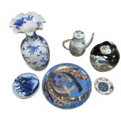 A collection of Japanese porcelain to include an Arita vase, blue and white bowl and a jar and